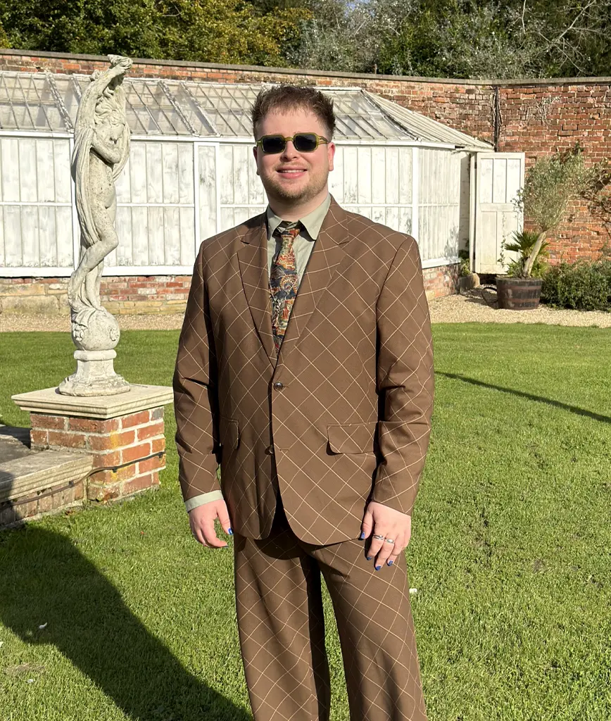 Image of Myles in a suit